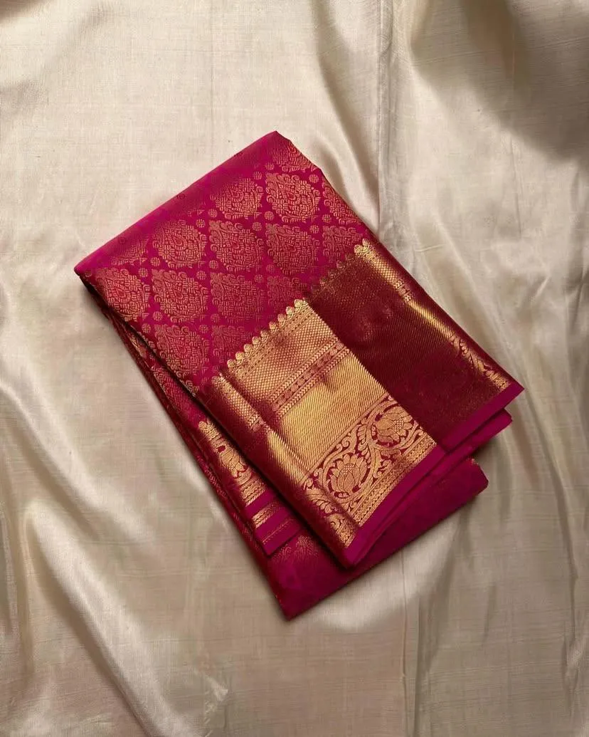 Ornate Dark Pink Soft Silk Saree With Exquisite Blouse Piece