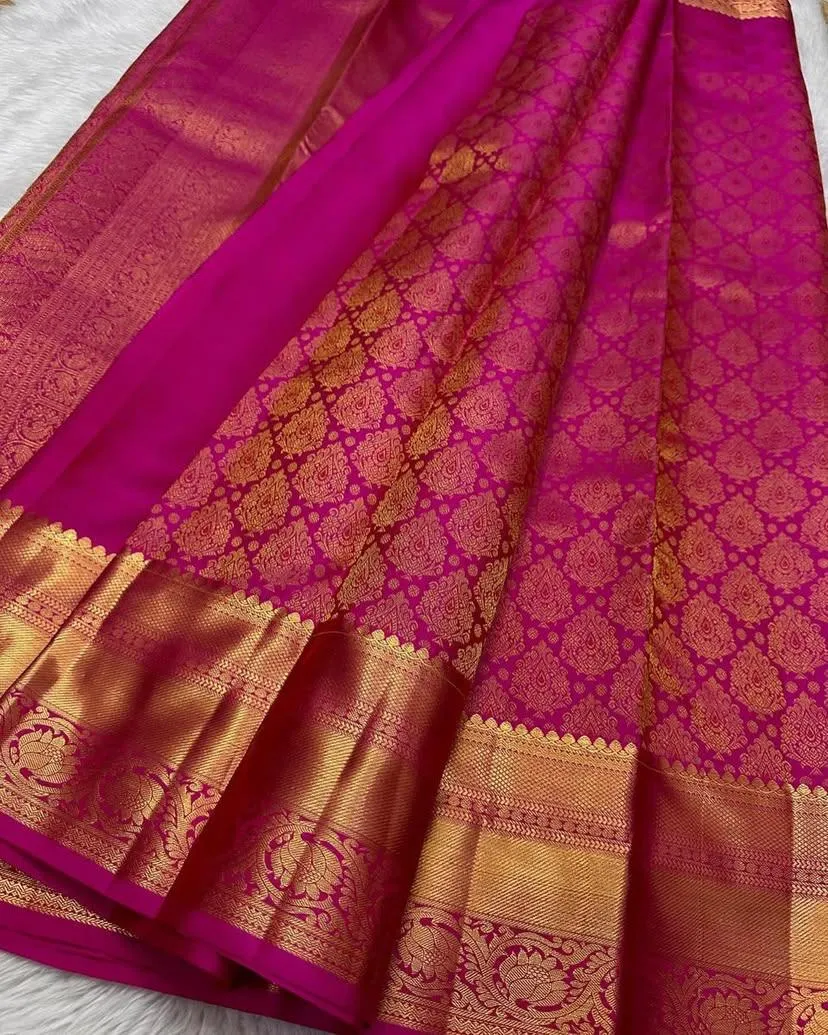 Ornate Dark Pink Soft Silk Saree With Exquisite Blouse Piece