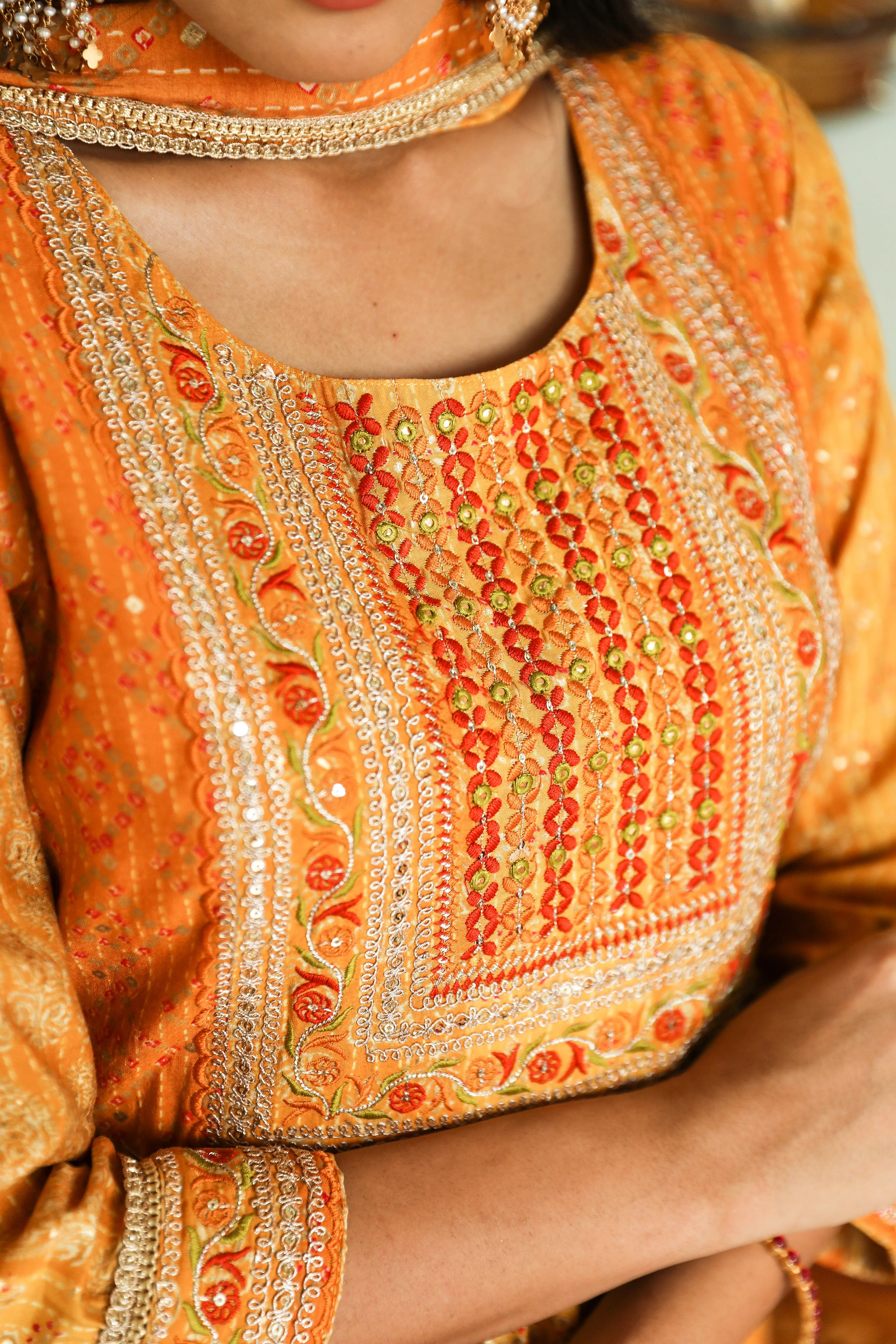 Women Mustard Muslin Nyara Cut A-Line Kurta Trouser Dupatta & Fancy Potli Set
